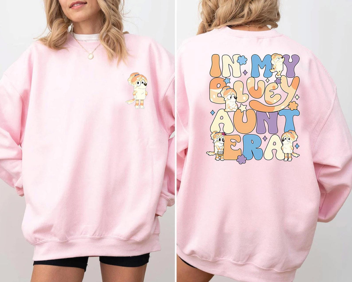 a woman wearing a pink sweatshirt and shorts