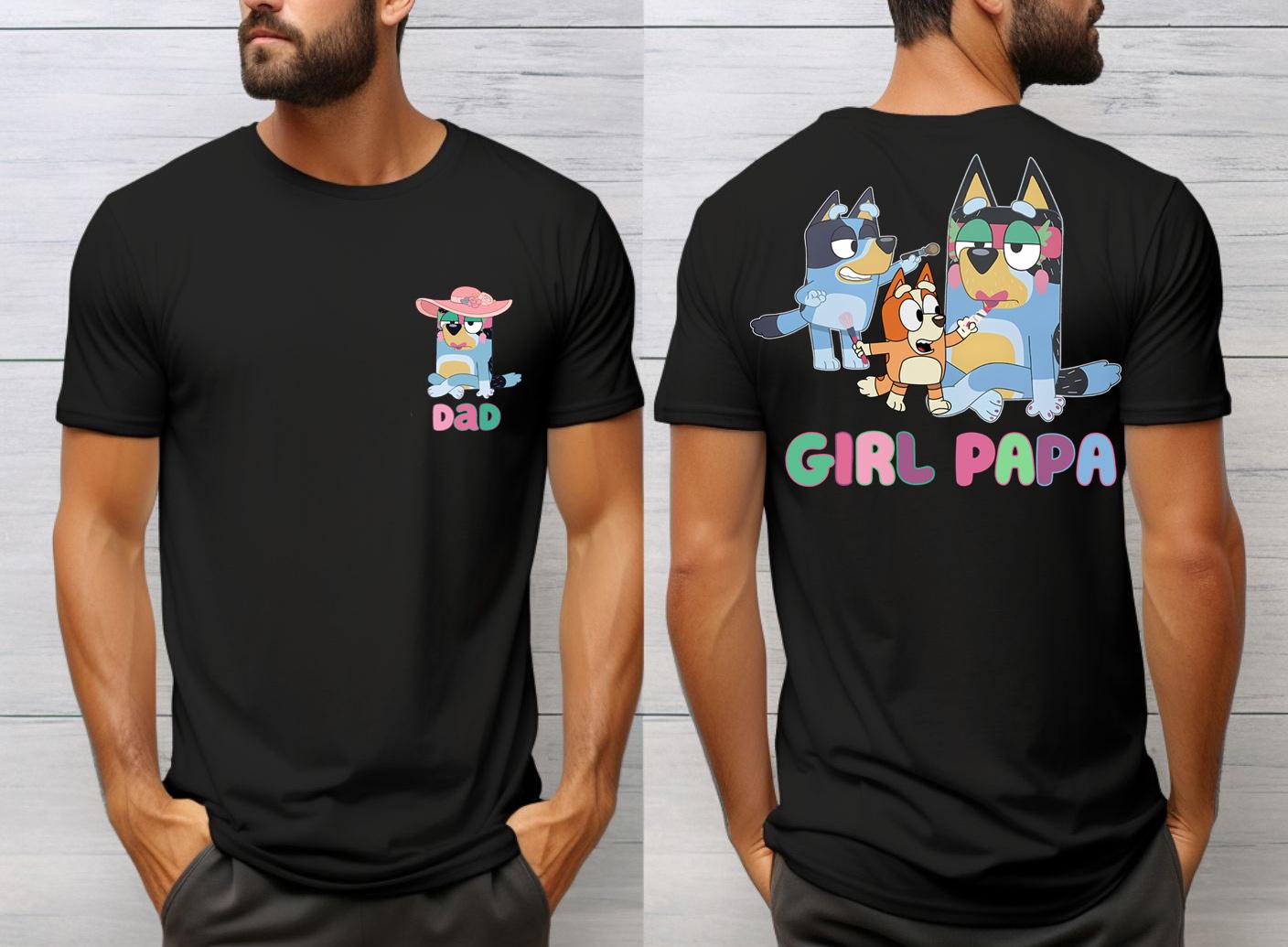 A black t-shirt with a graphic design featuring cartoon characters and text.