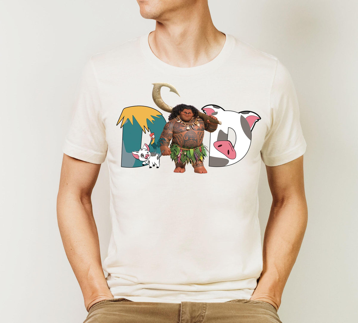 a man wearing a t - shirt with a cartoon character on it