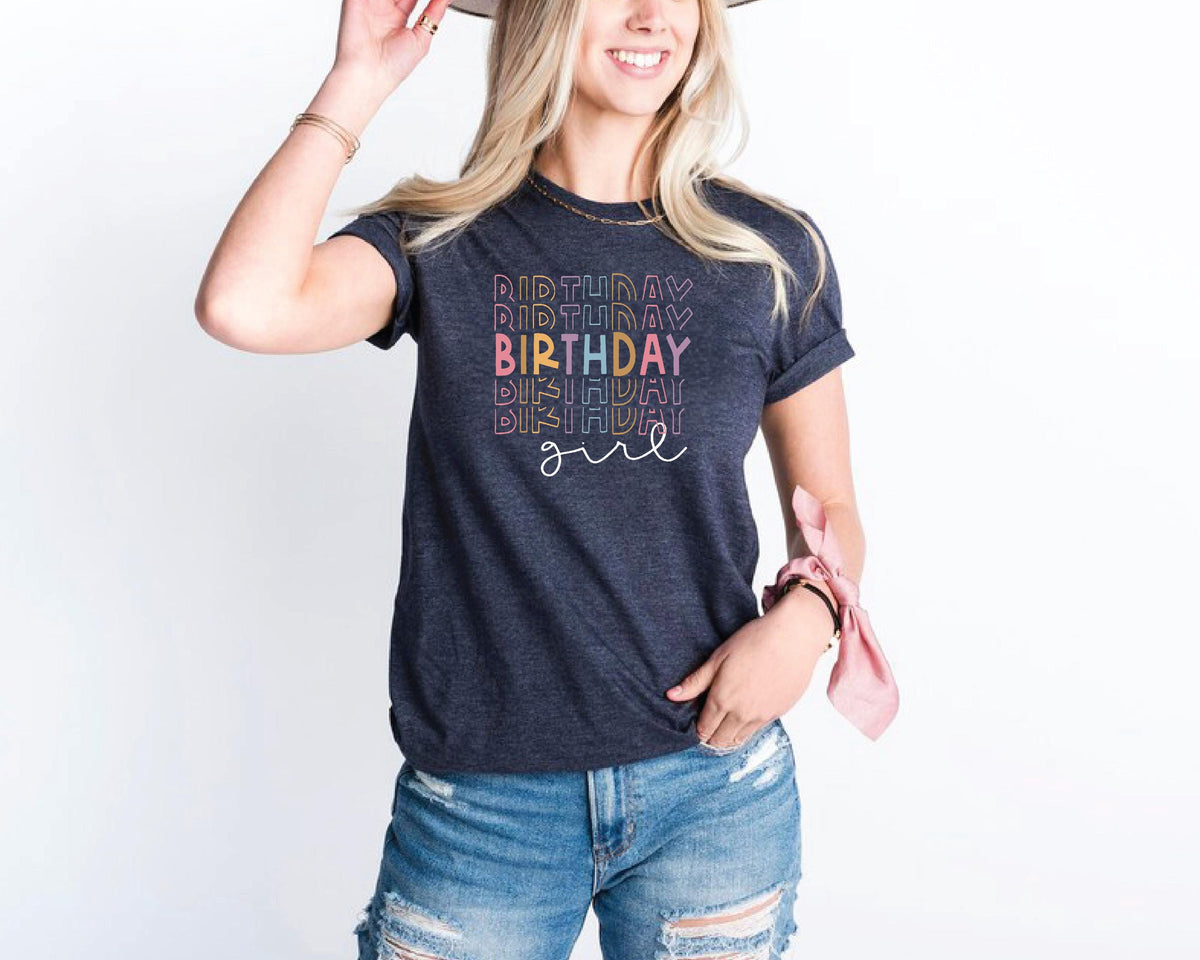 a woman wearing a hat and a birthday shirt