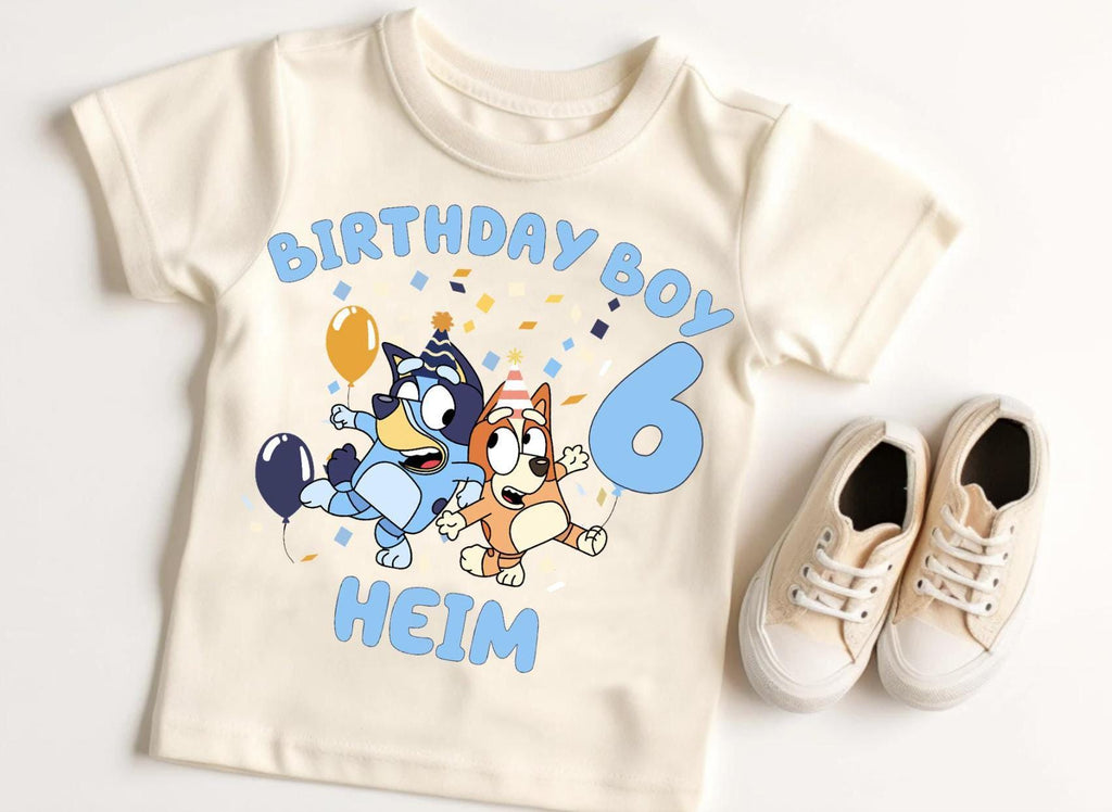 a pair of shoes and a t - shirt with a cartoon character on it