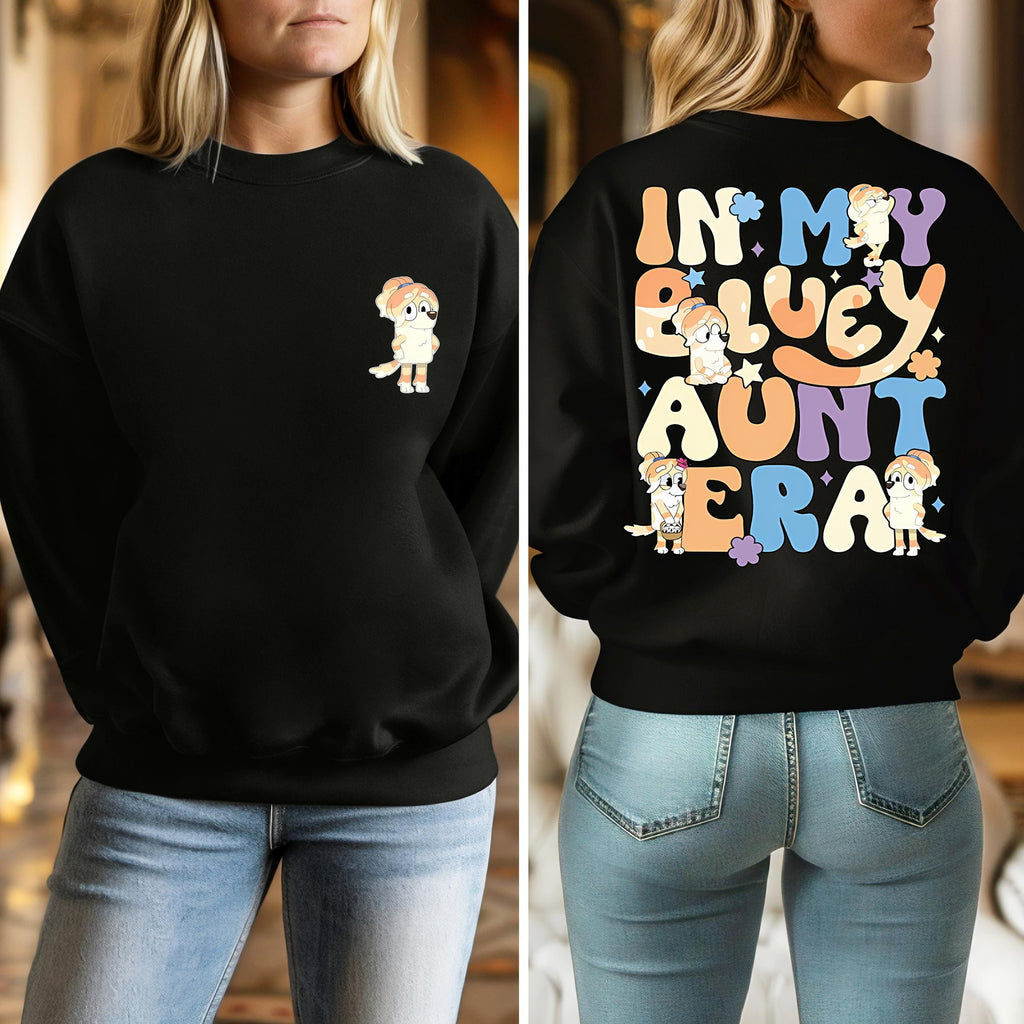 a woman wearing a black sweatshirt with the words in my bluey aunt era on