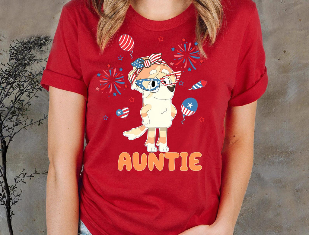 a woman wearing a red shirt with an image of an animal on it