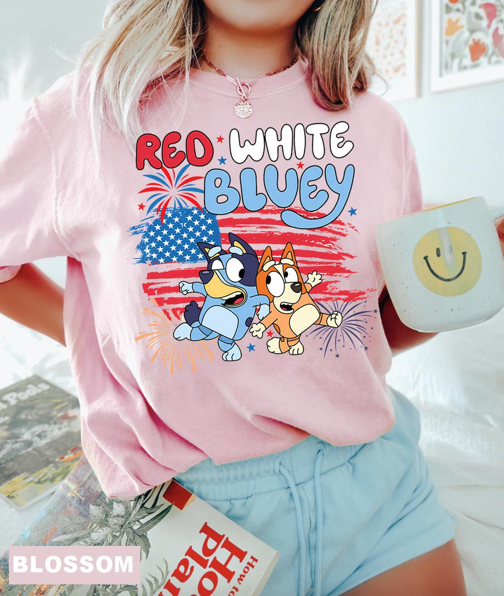 a girl in a pink shirt and blue shorts