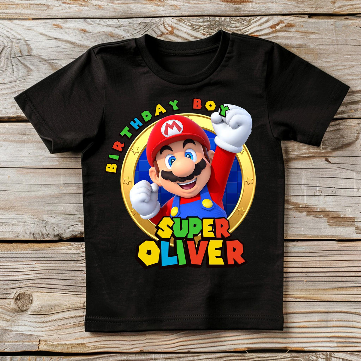 a black t - shirt with a picture of a super mario on it