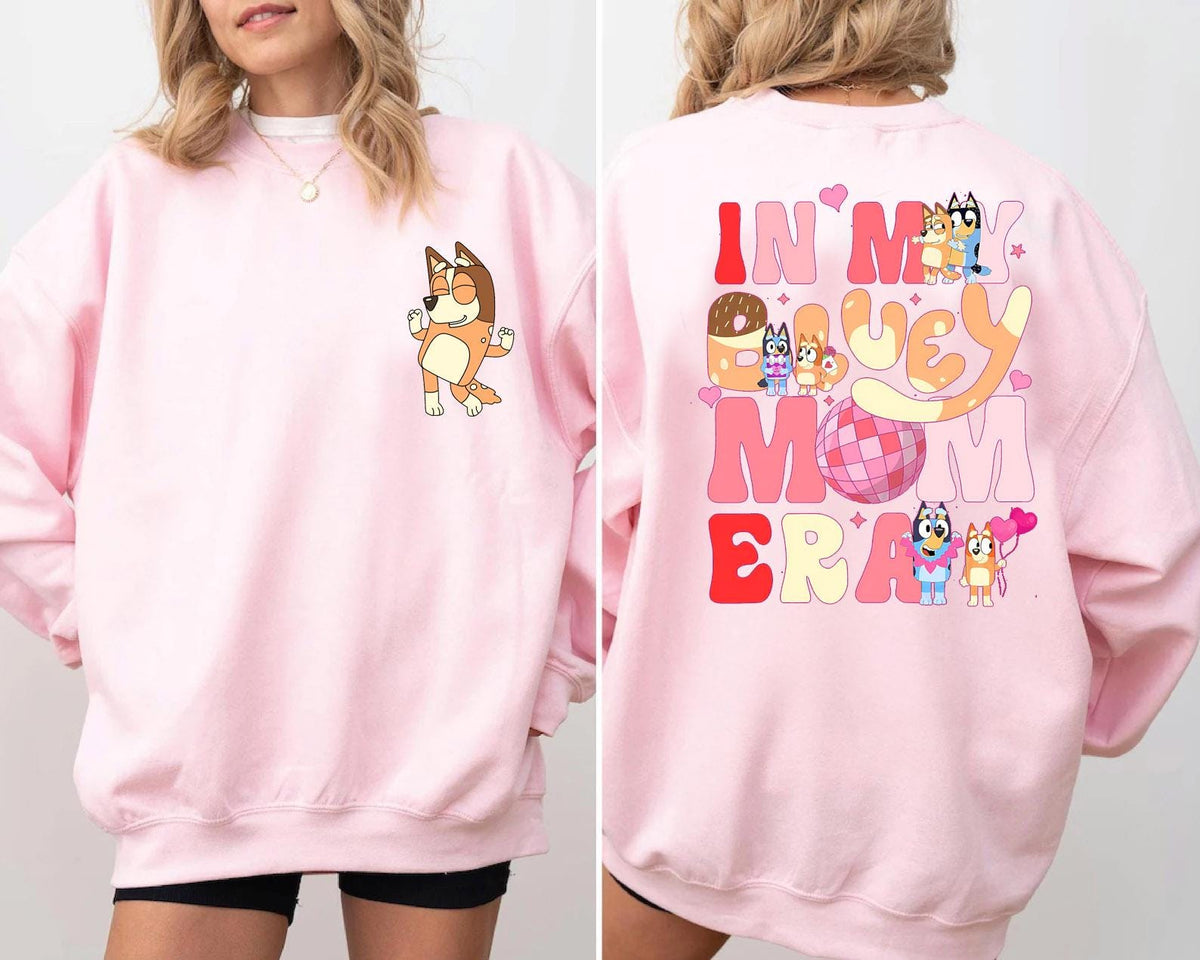 a woman wearing a pink sweatshirt and shorts