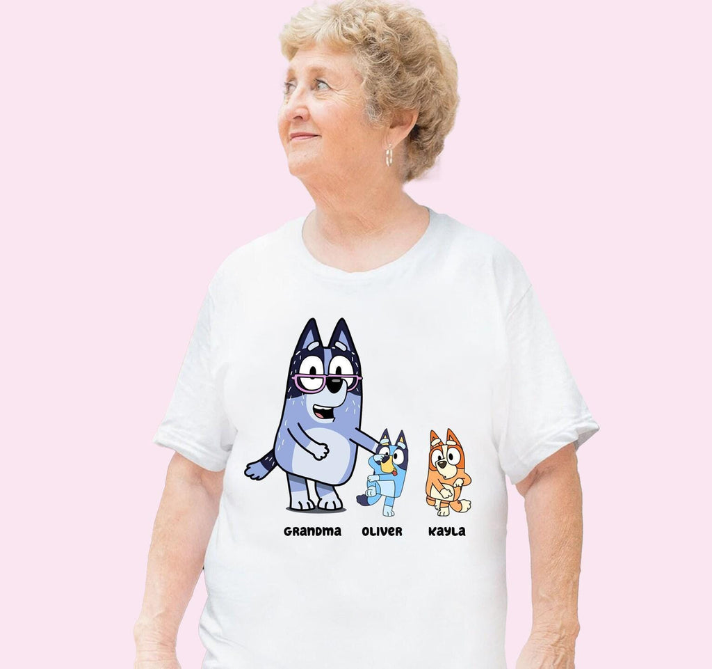 a woman wearing a white t - shirt with cartoon characters on it