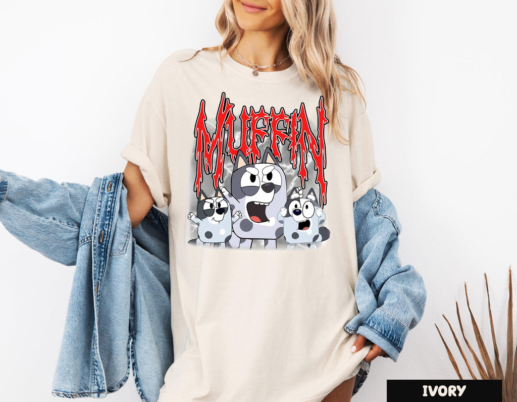 a woman wearing a white shirt with a cartoon character on it