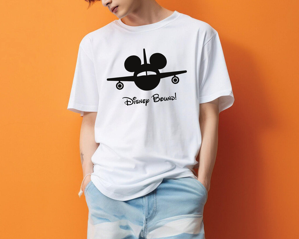 a young man wearing a mickey mouse t - shirt