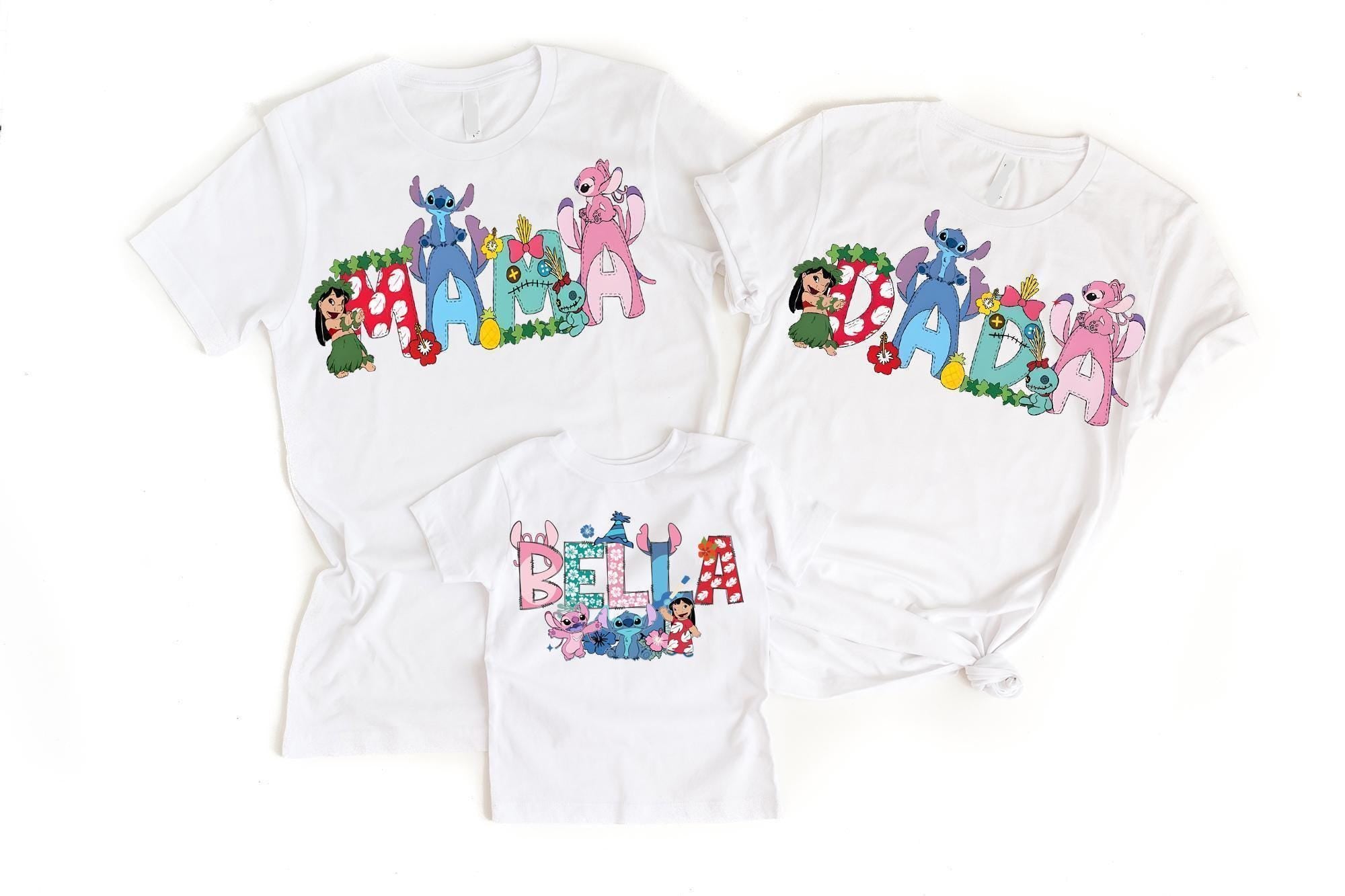 three white t-shirts with colorful cartoon characters and the name "Bella" printed on them.