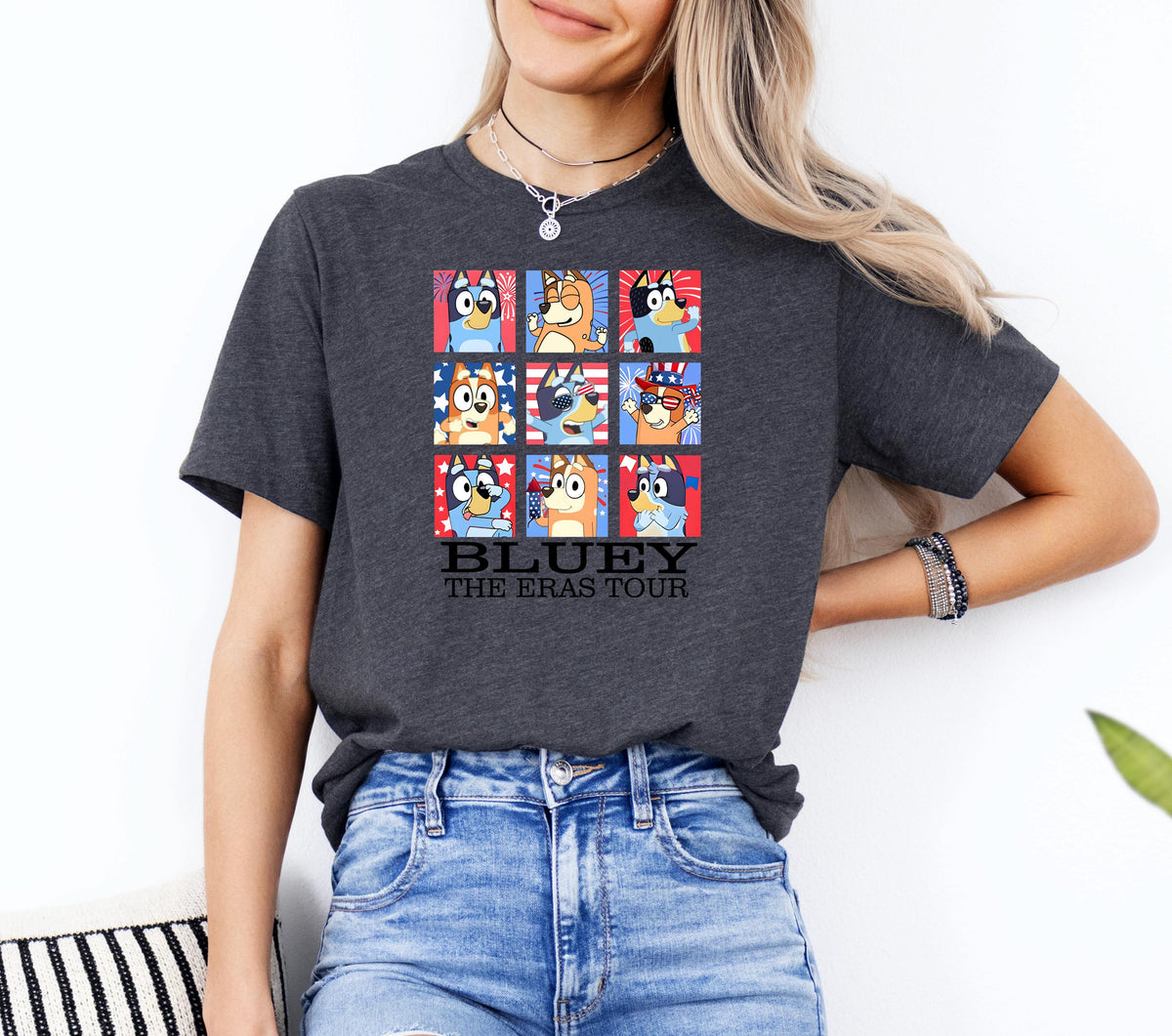 a woman wearing a mickey the bead tour t - shirt
