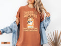 a woman wearing a t - shirt that says i need minutes when someone comes near