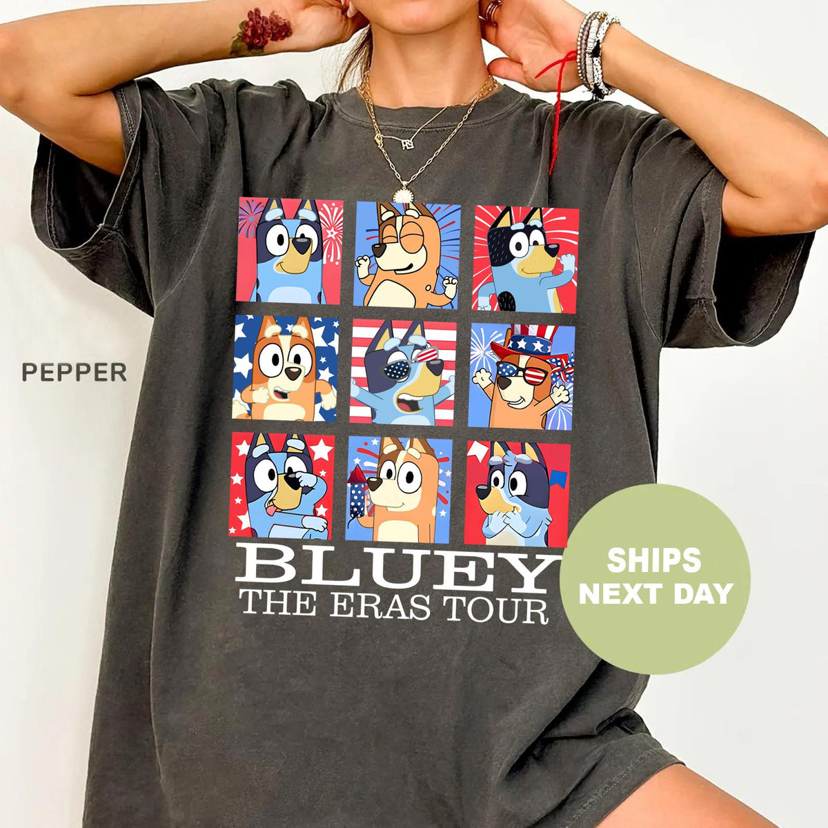 a woman wearing a t - shirt with cartoon characters on it