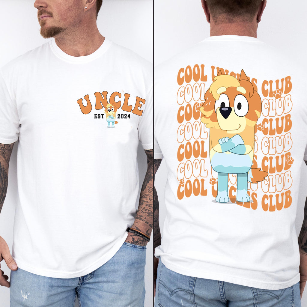 a man wearing a t - shirt with a cartoon character on it