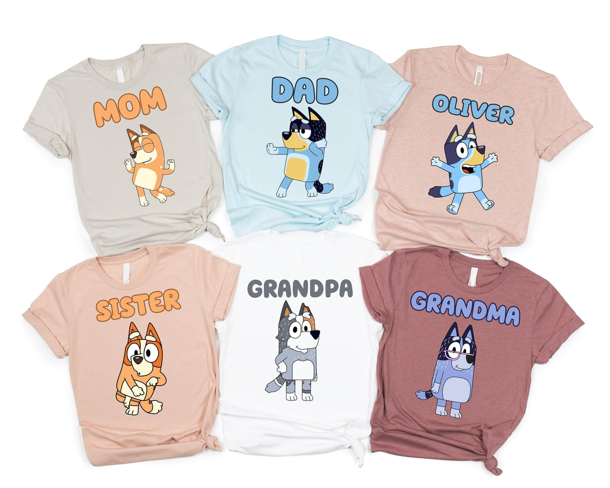 a group of t - shirts with cartoon characters on them