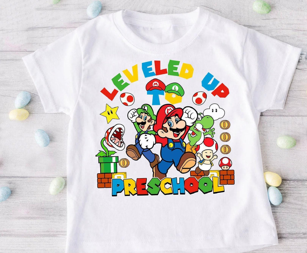 a white t - shirt with an image of mario and luigi on it