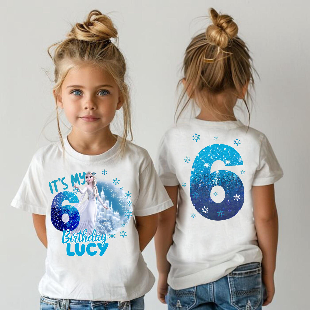 two little girls standing next to each other