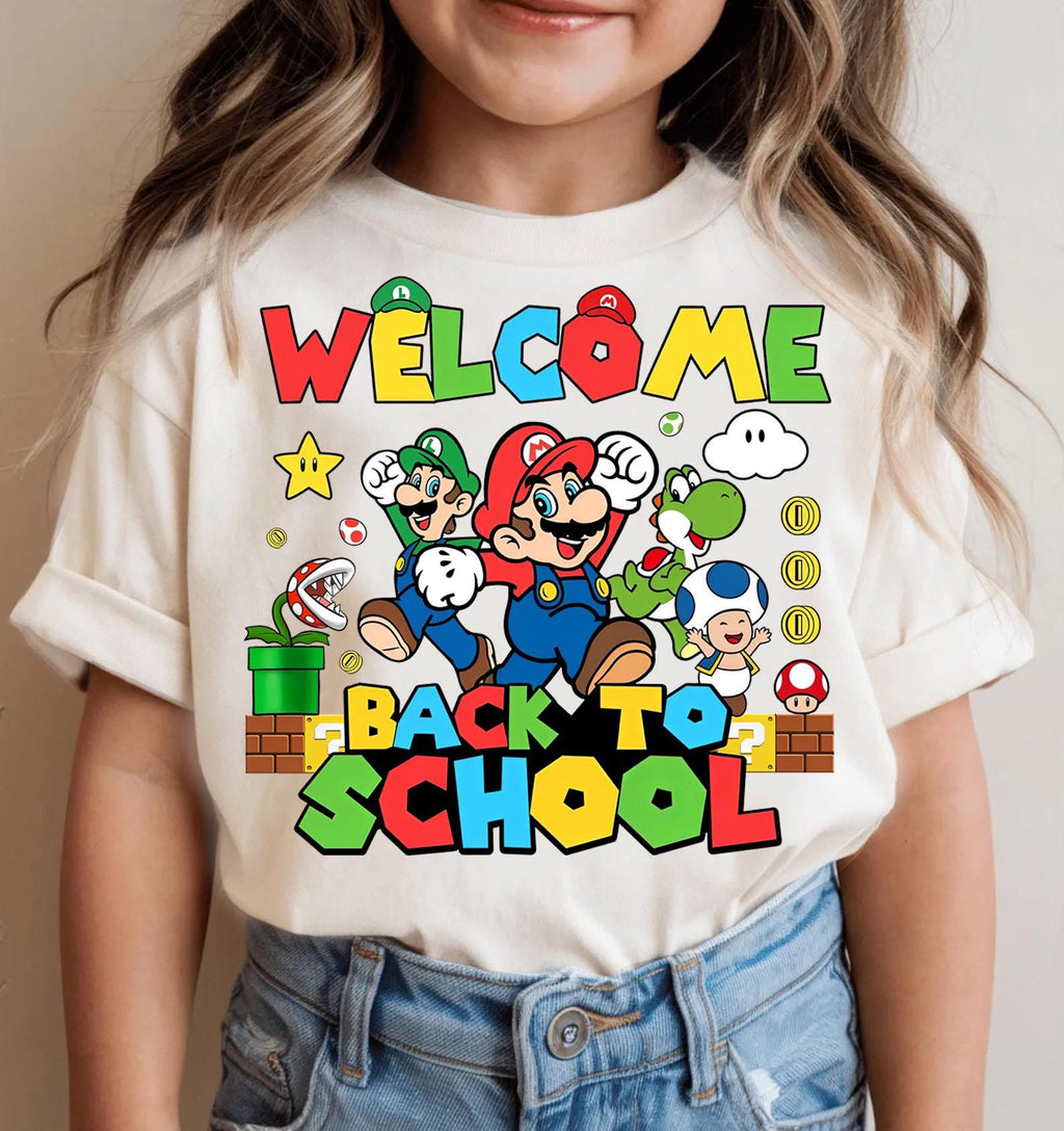 a young girl wearing a t - shirt that says welcome back to school