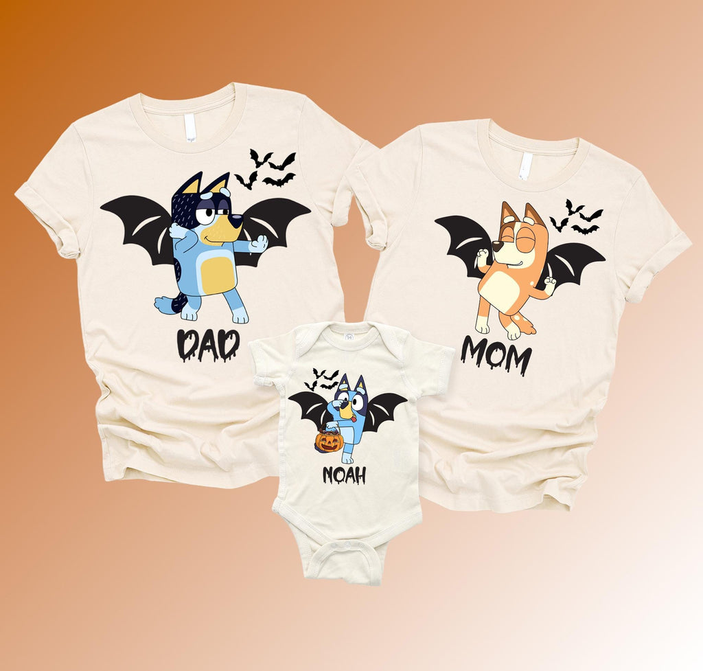 three t-shirts with cartoon bat characters and the names "DAD", "MOM", and "NOAH" printed on them.