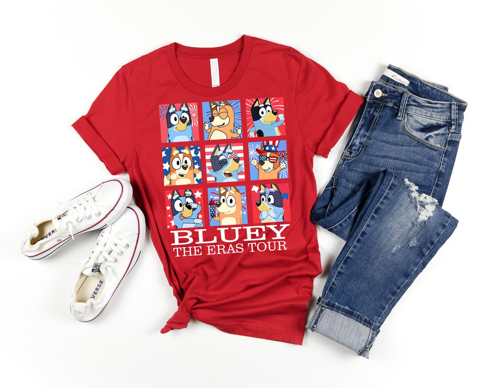 a t - shirt that says bluey the eras tour next to a pair of