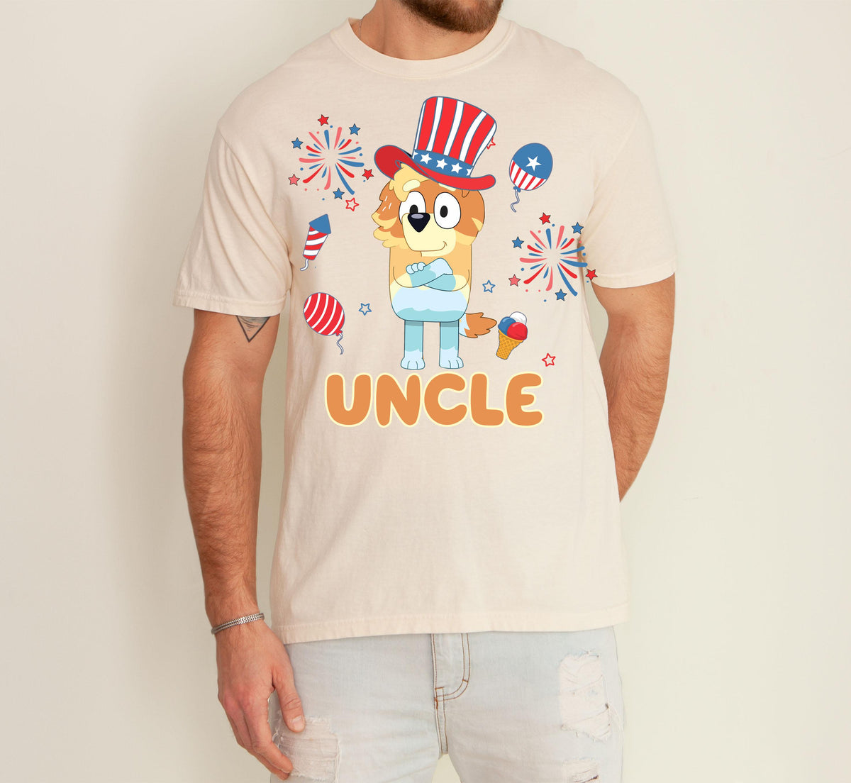 a man wearing a t - shirt with an uncle on it