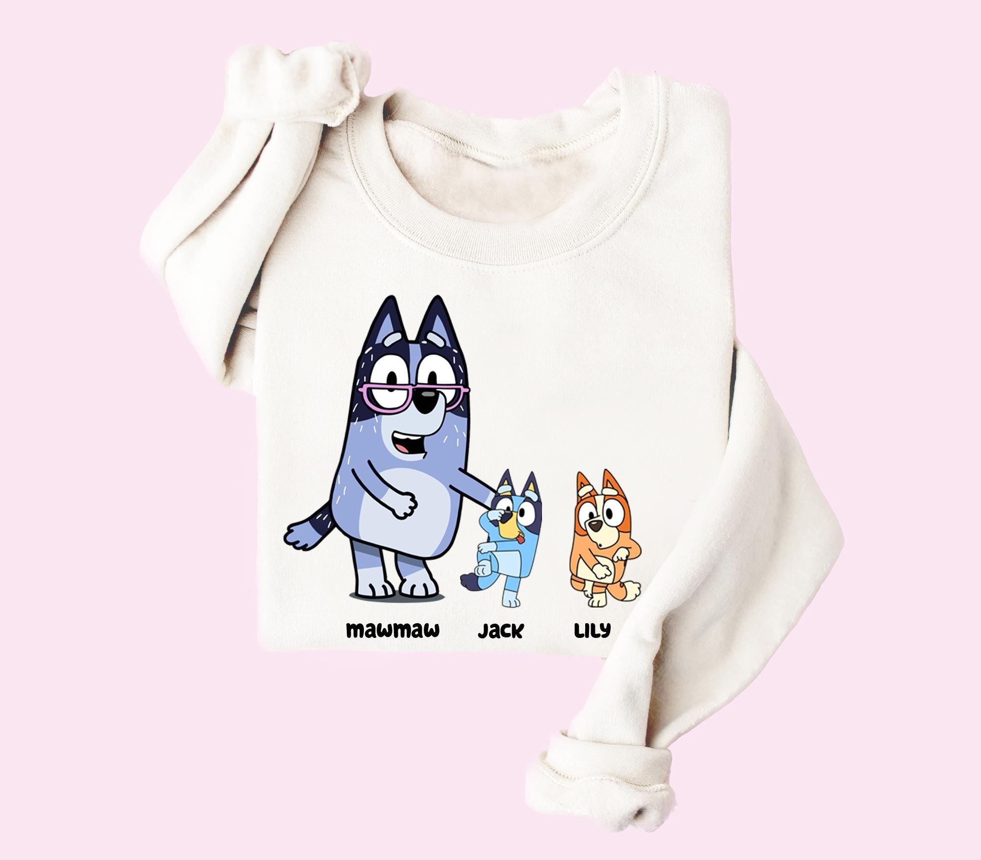 a white shirt with cartoon characters on it