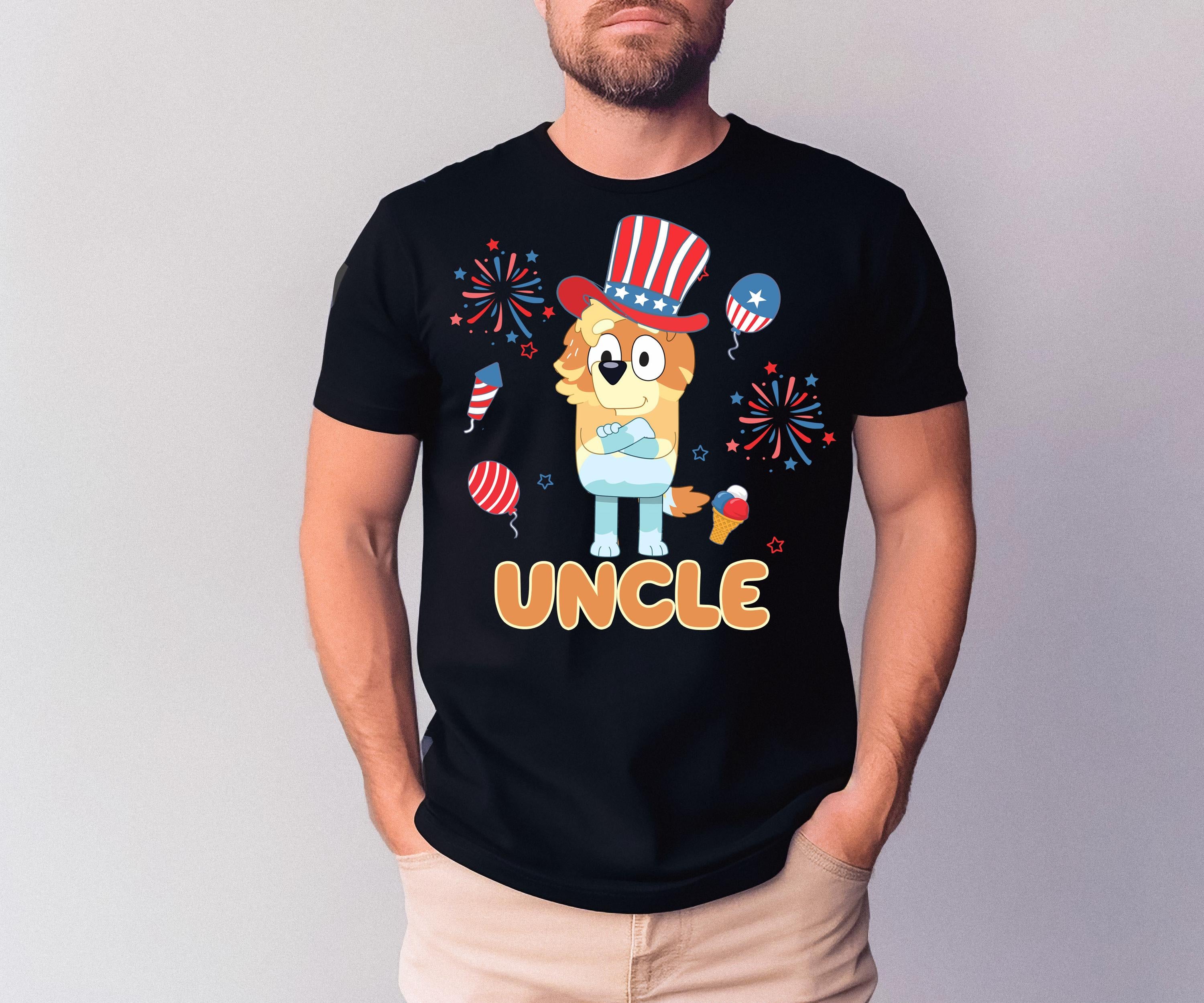 a man wearing a t - shirt with an uncle on it
