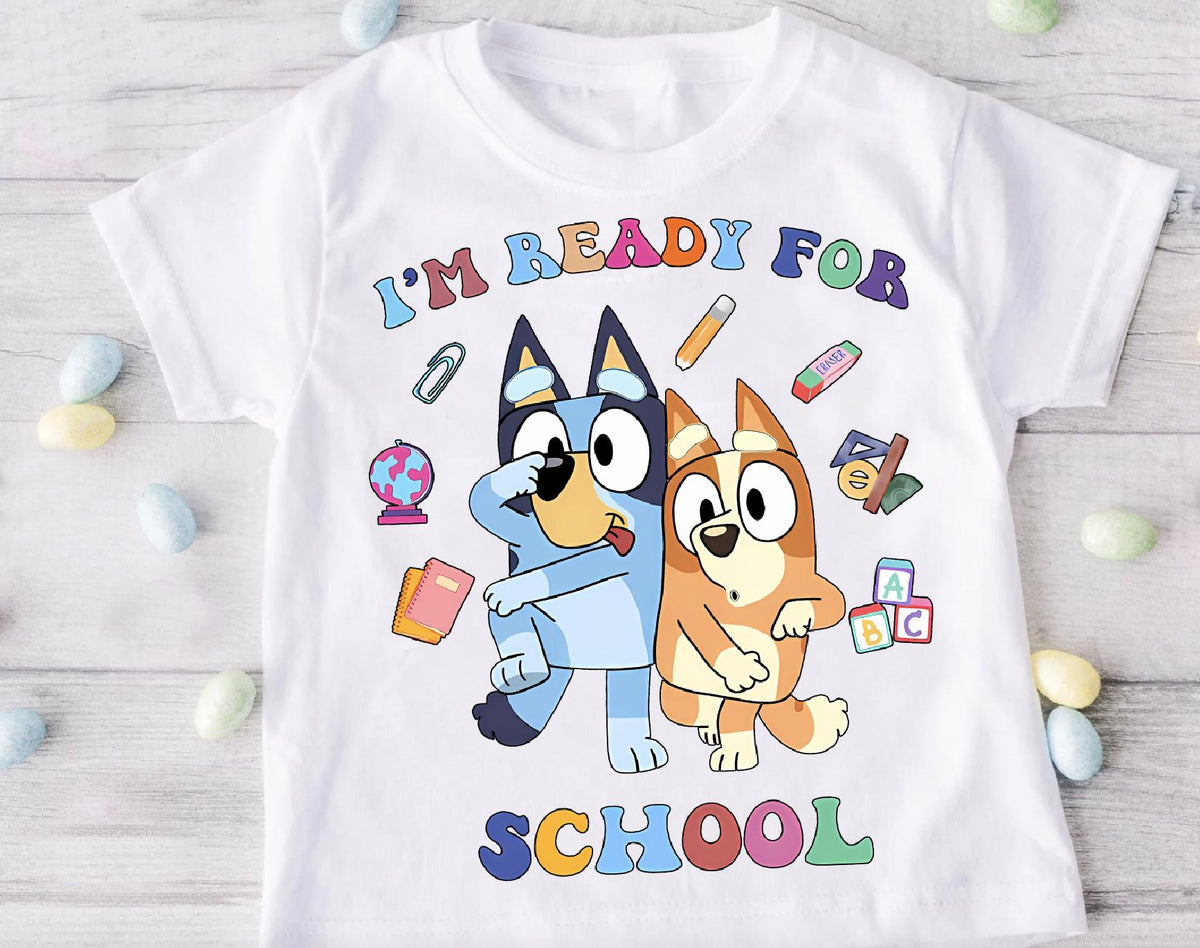 a child's t - shirt with an image of a dog and a cat