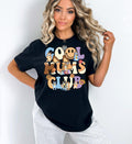 a woman wearing a black shirt that says good moms club