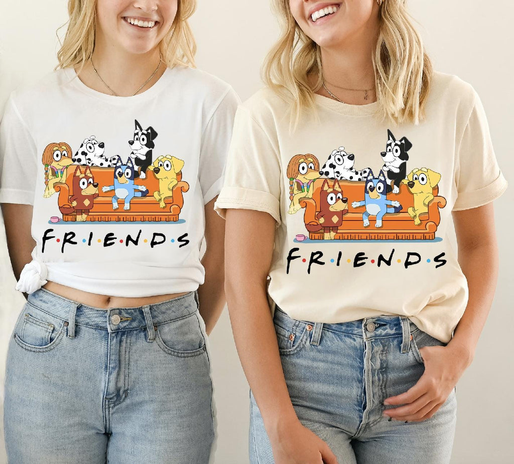 two women wearing matching t - shirts that say friends