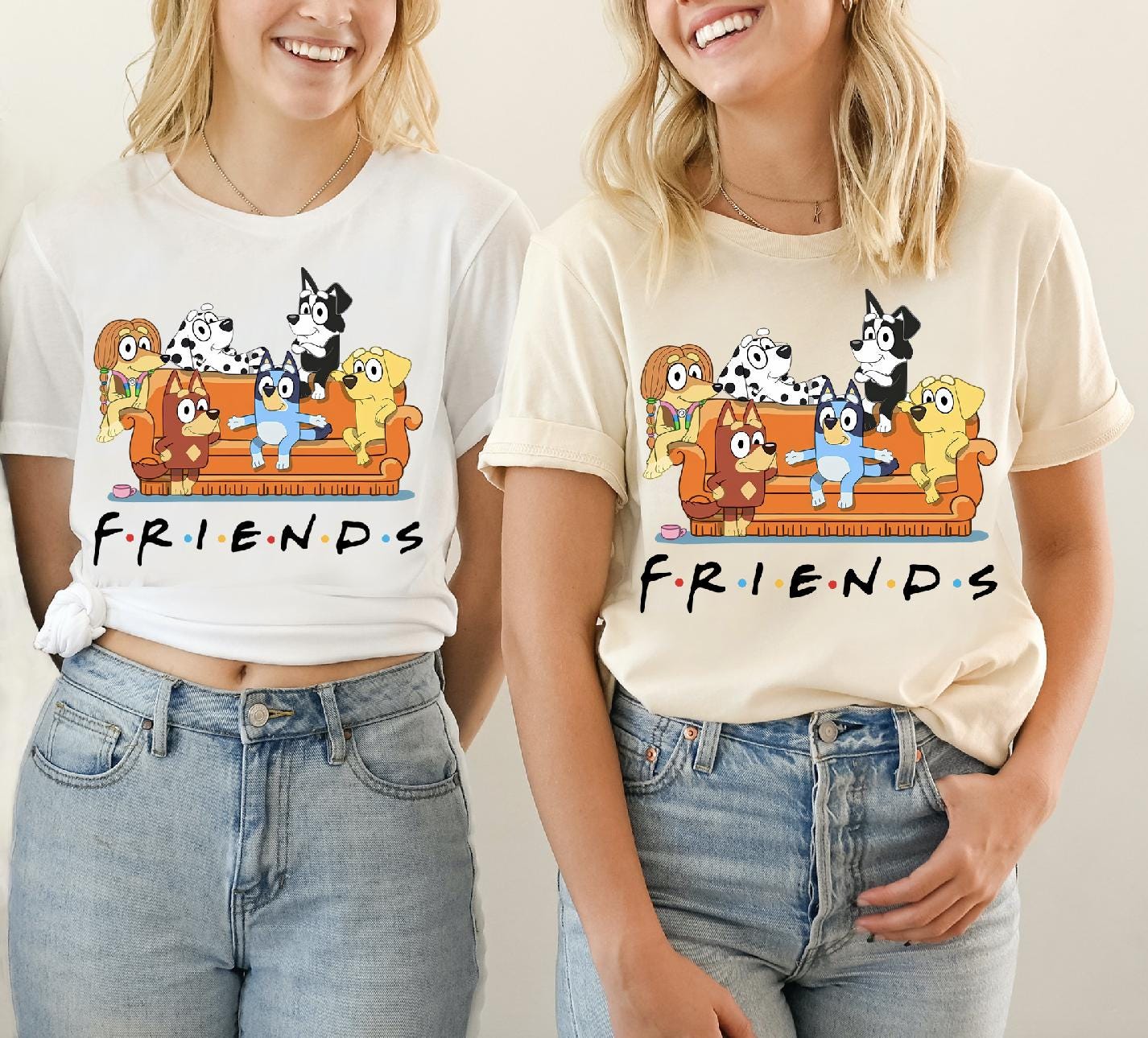 two women wearing matching t - shirts that say friends