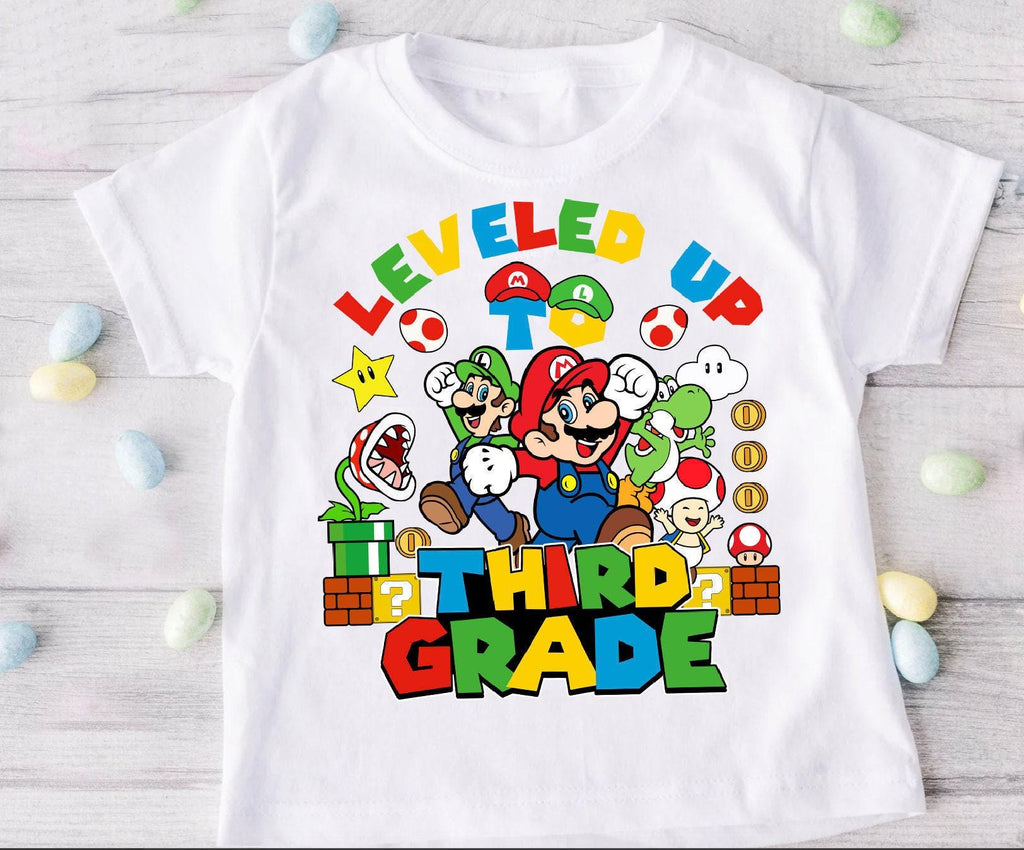 a white shirt with a mario and luigi on it