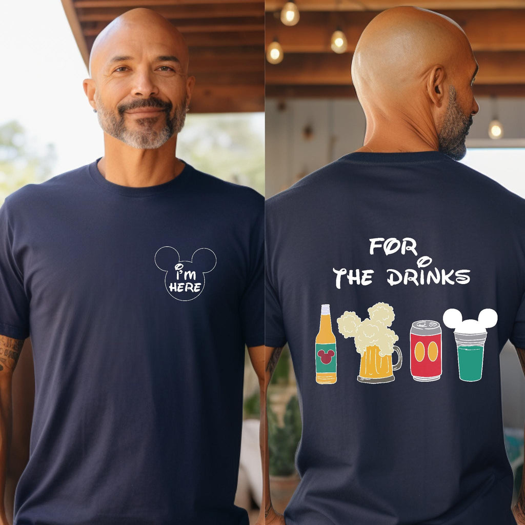 A man wearing a navy blue t-shirt with a graphic design on the back, which features a Mickey Mouse logo and various drinks.