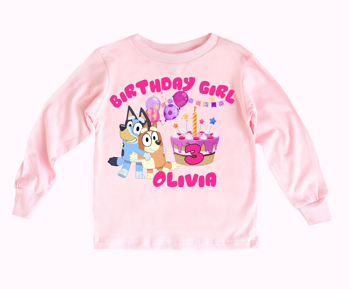 a girl's pink birthday shirt with cartoon characters on it