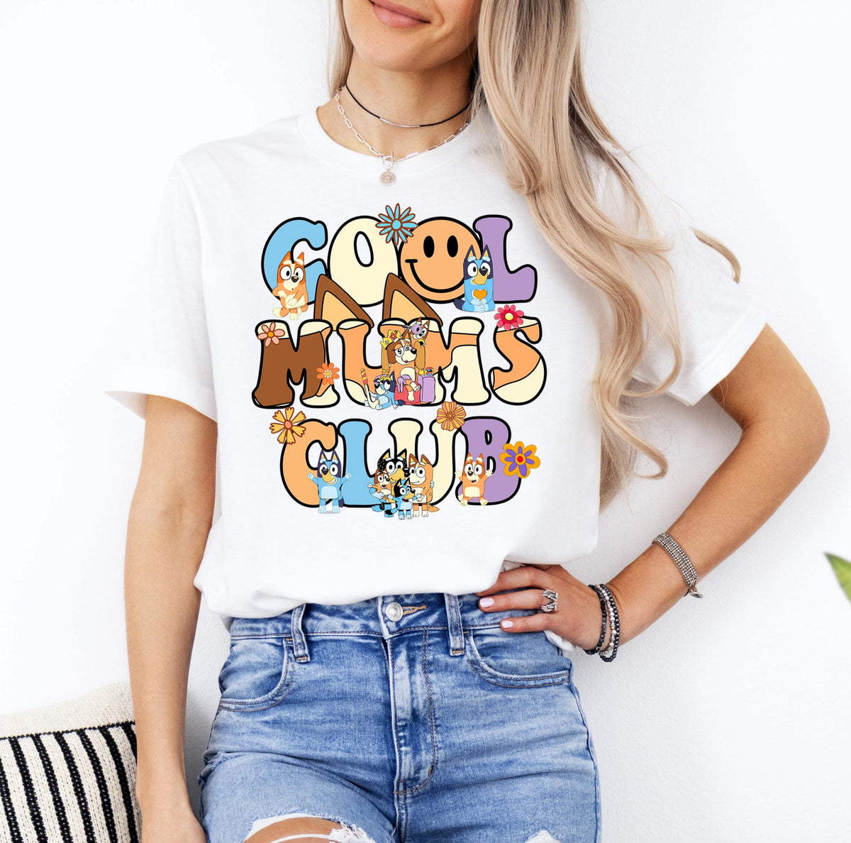 a woman wearing a t - shirt that says cool kids club