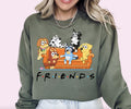 a woman wearing a sweatshirt that says friends on it