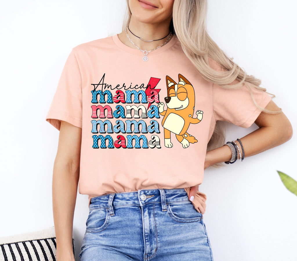 a woman wearing a pink shirt with a dog on it