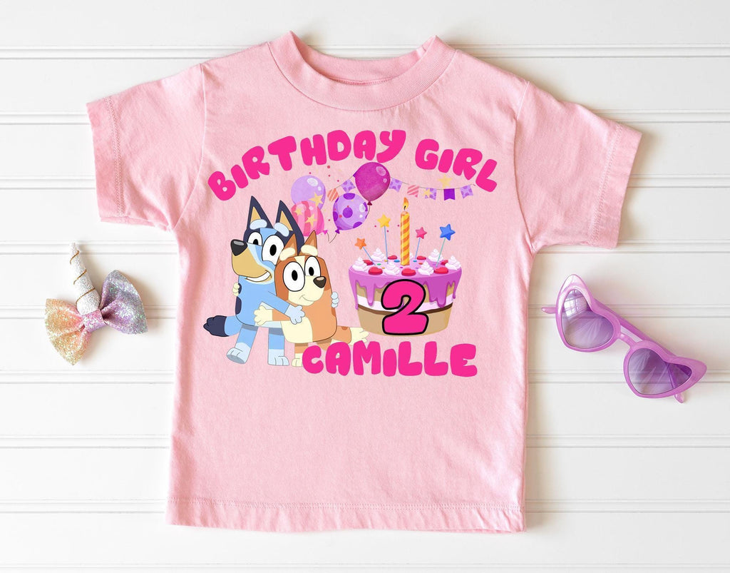 a pink birthday shirt with a cartoon character on it