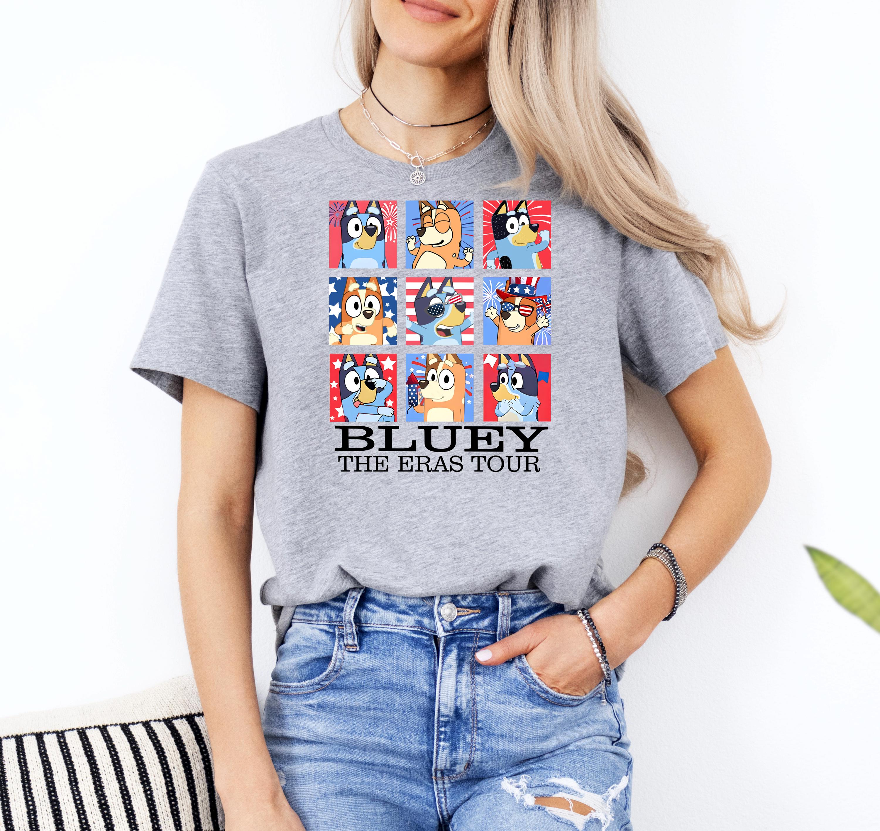 a woman wearing a bluey the eras tour t - shirt