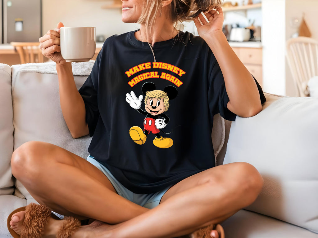 a woman sitting on a couch holding a cup of coffee