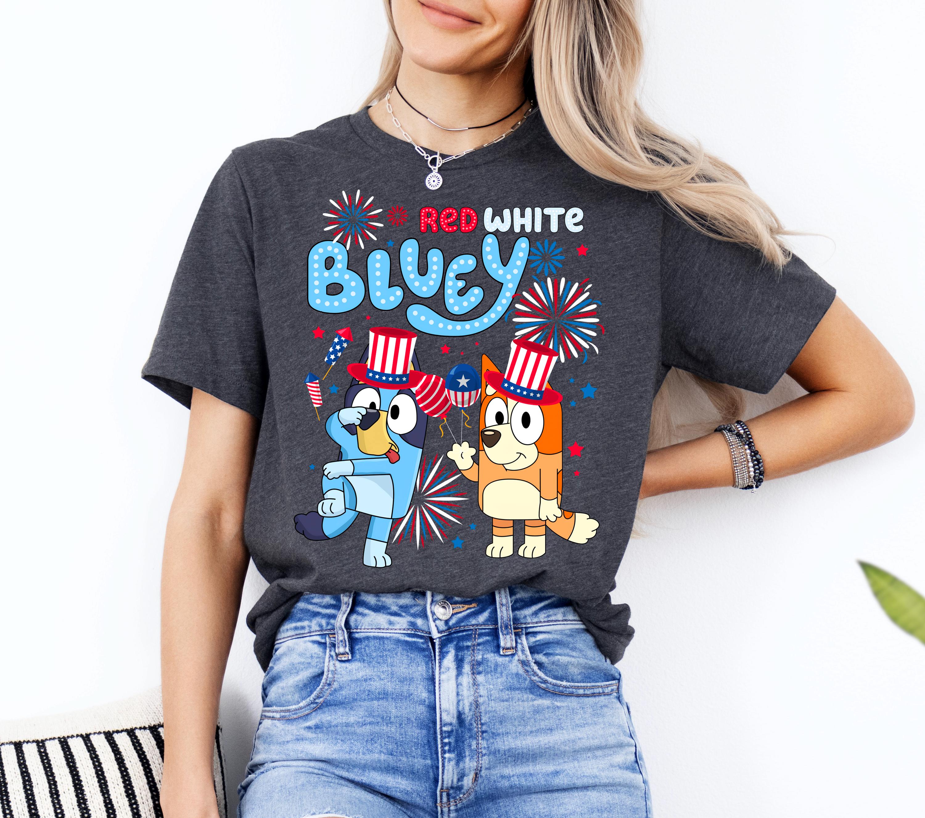 a woman wearing a red white and blue shirt